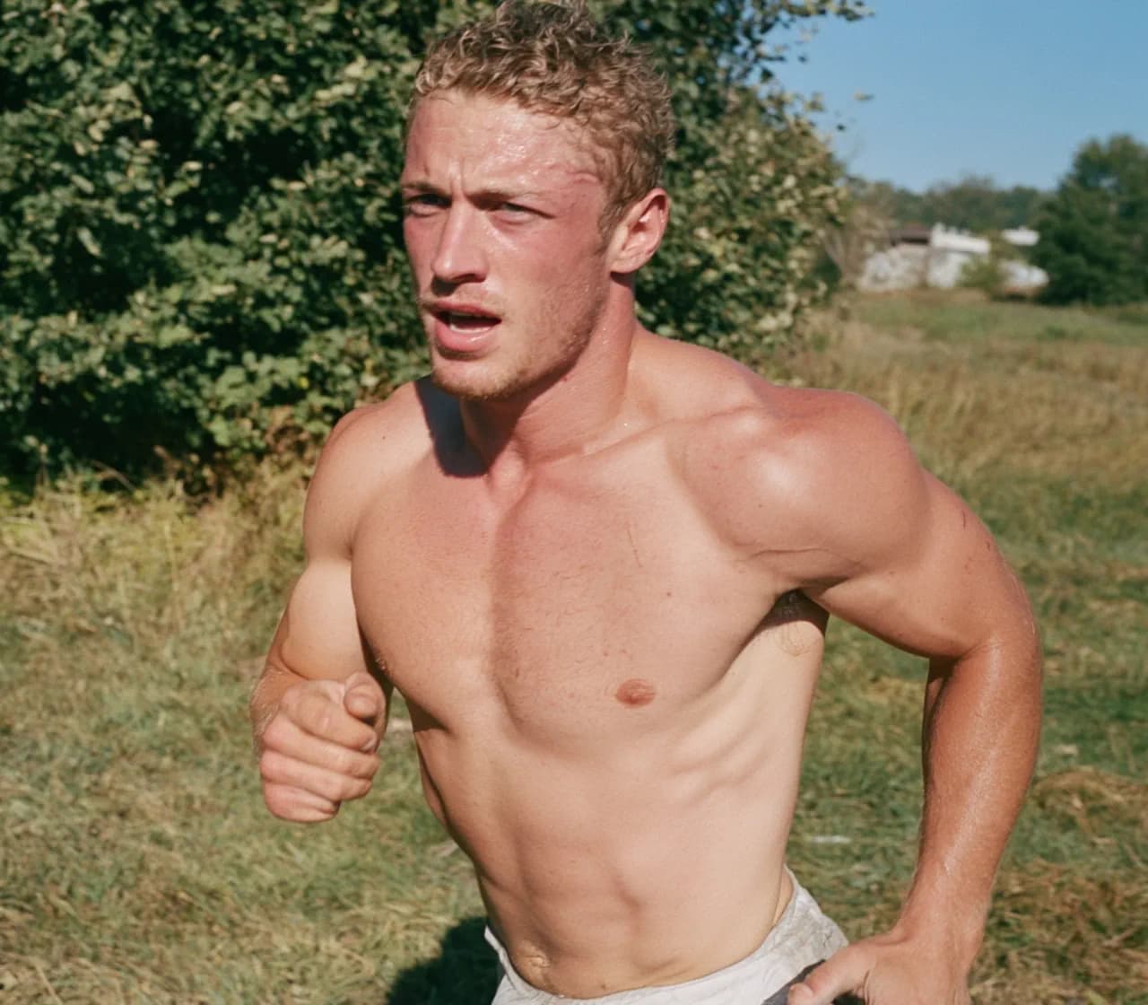 A runner outdoors on a sunny day.